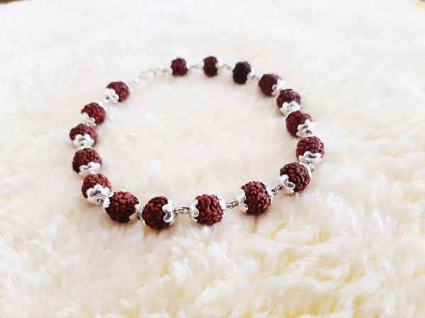 70 Silver Rudraksha Bracelet With Flower Caps