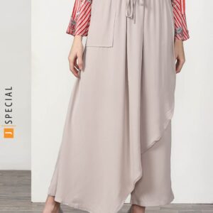 Wide Leg Pants Featuring Elasticated Waist Band With Tie-Up Detailing And A Uneven Layer At Front